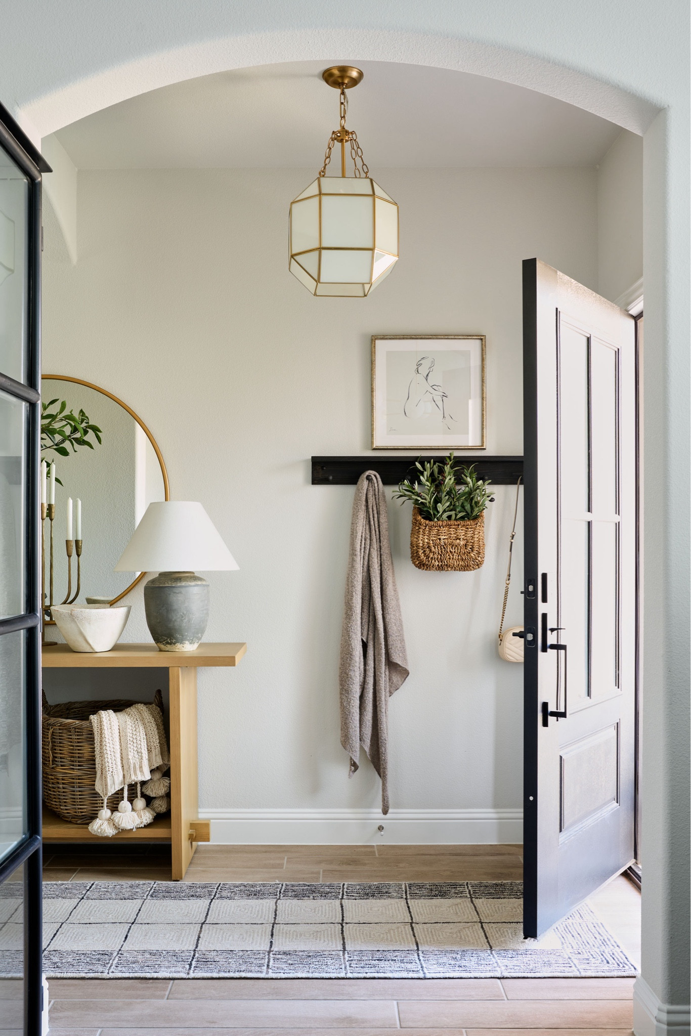 Here’s a side view of my
Entryway!

Photo taken by Stacy Markow Photography

Lighting 
Pendant
Chandelier
Door
Console
Cabinet
Shelf
Table decor
Mirror art
Wall art
Studio McGee 
McGee and co
Pottery barn
Visual comfort

#LTKhome