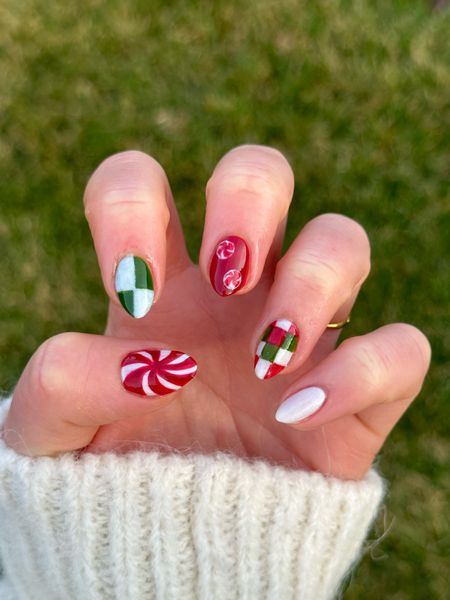 Get the mani look: all polish colors by Olive & June💅🏻 Christmas nails, holiday nails, manicure at home, nail polish 🍬🎄

#LTKbeauty #LTKHoliday #LTKunder50