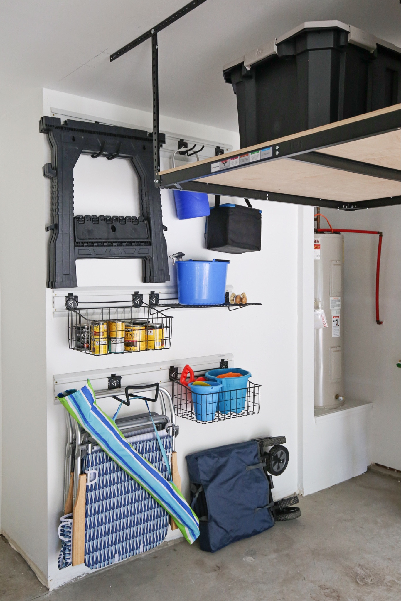#ad Adding garage storage and organization with @loweshomeimprovement. Using overhead garage ceiling storage shelves, garage wall storage, heavy duty storage hooks, and metal wire storage baskets #Lowespartner #garagestorage #storagesolutions #garageorganization

#LTKHome