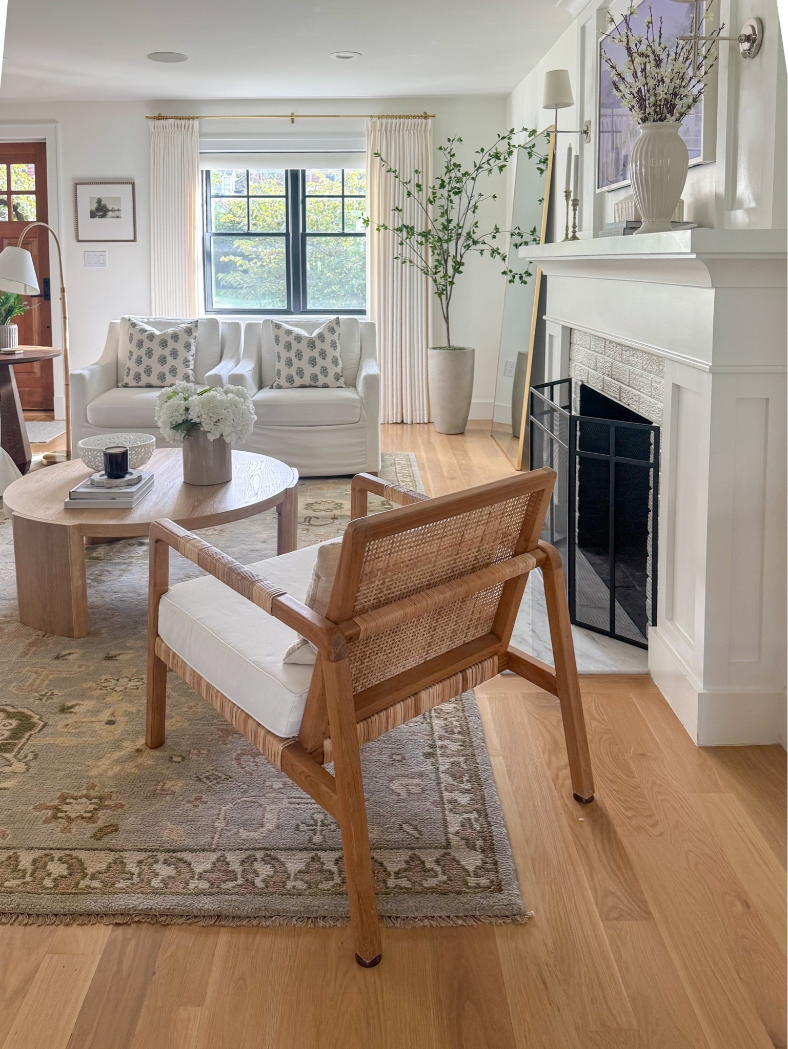 A little living room refresh with layers of texture, soft color, and timeless pieces. 🤍 This 100% wool rug from Quince brings in the prettiest muted blues, blush, greens, and ivory, grounding our affordable slipcovered sofa (that PB look for less!) and classic slipcovered chairs. An arched floor lamp and oversized walnut side table add warmth and interest — and I love that the table would be equally beautiful styled in an entryway.

A collected, cozy look with a mix of high and low. Everything linked!

#LTKHome #LTKSaleAlert #LTKdayinmylife