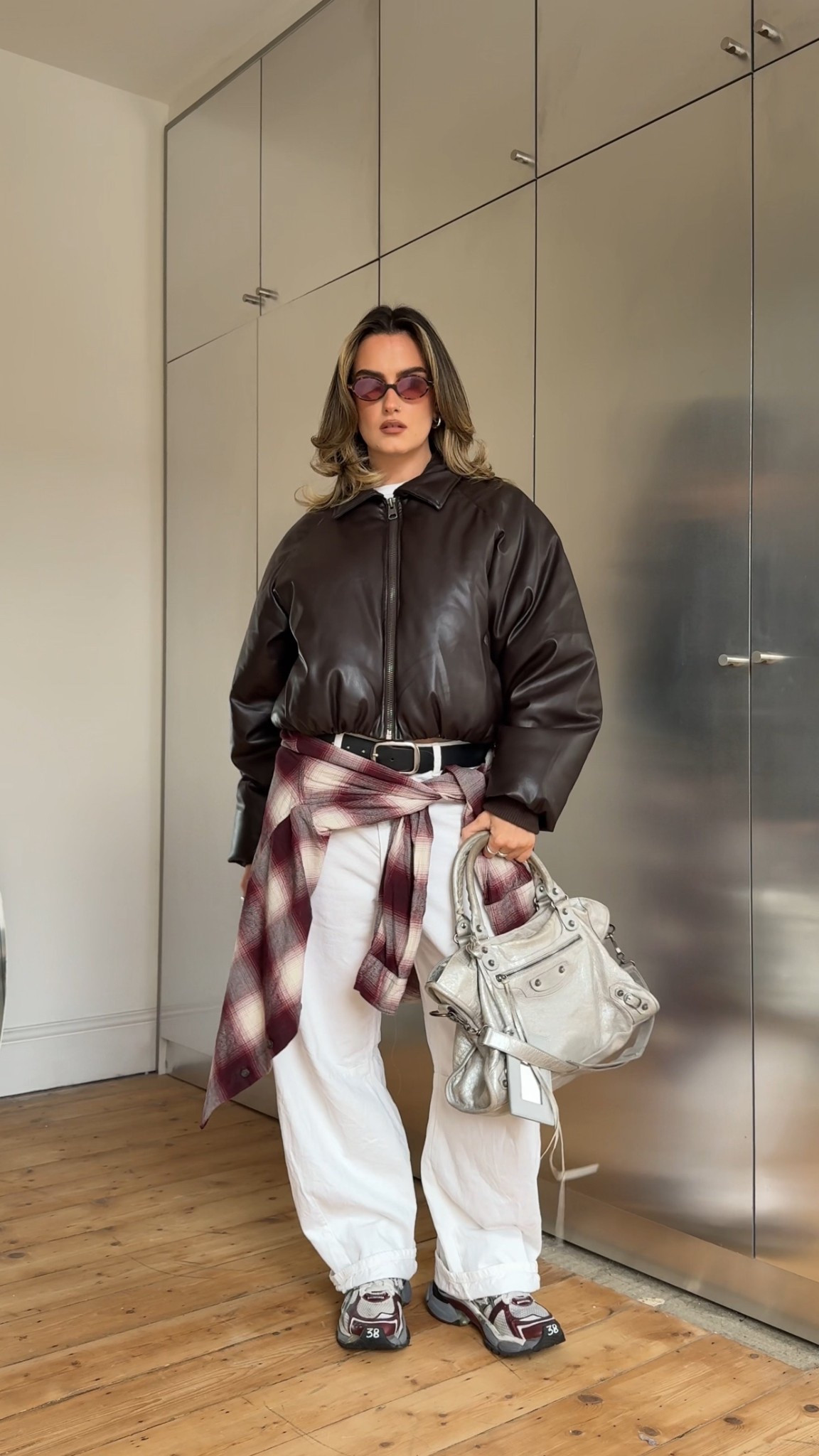 Bomber jacket, check shirt, barrel leg, white jeans, balenciaga, chunky trainers, city bag, silver bag

#LTKuk #LTKautumn #LTKwinter