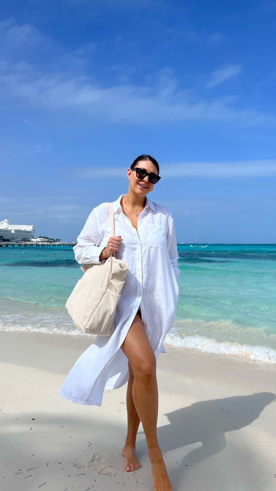 Beach days but make it effortless 🤍 a breezy white button-down dress that doubles as the easiest swimsuit cover-up—lightweight, flattering, and perfect for walking straight from the sand to lunch.

Keywords: white button down dress, beach cover up, vacation outfit, resort wear, summer beach outfit, white shirt dress, coastal style, minimalist vacation look, travel outfit, easy summer dress

#LTKSeasonal #LTKTravel #LTKMidsize
