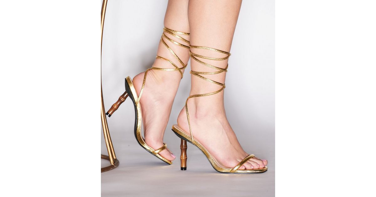 South Beach Gold Tie Faux Bamboo Heel Sandals
						
						Add to Saved Items
						Remove from S... | New Look (UK)