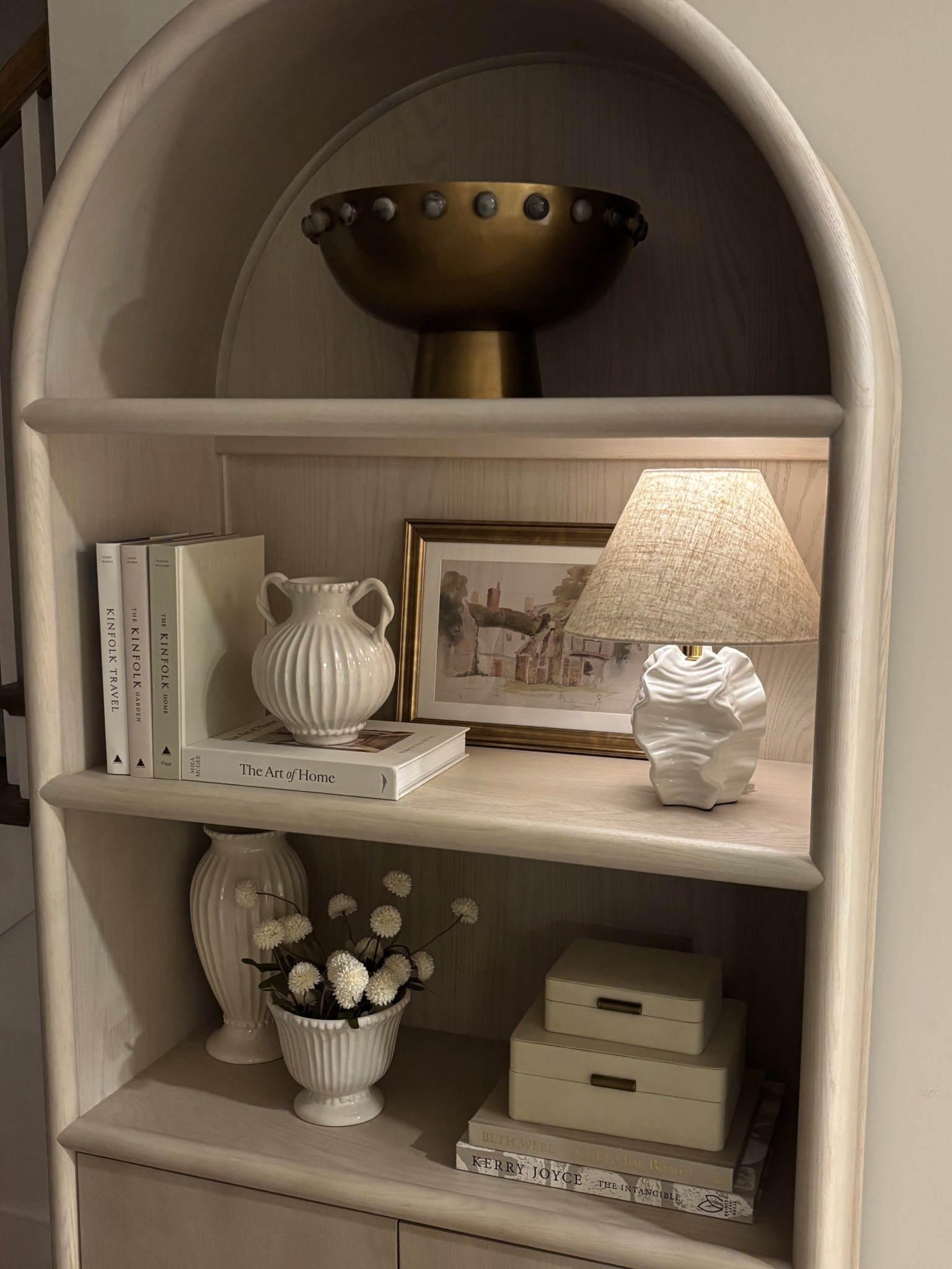 neutral bookshelf decor 🤍 refreshed my cabinet for spring & love it so much! This lamp is on the pricier side for Target but it’s similar to a designer one and is such good quality!! 

#LTKHome #LTKFindsUnder50 #LTKFindsUnder100