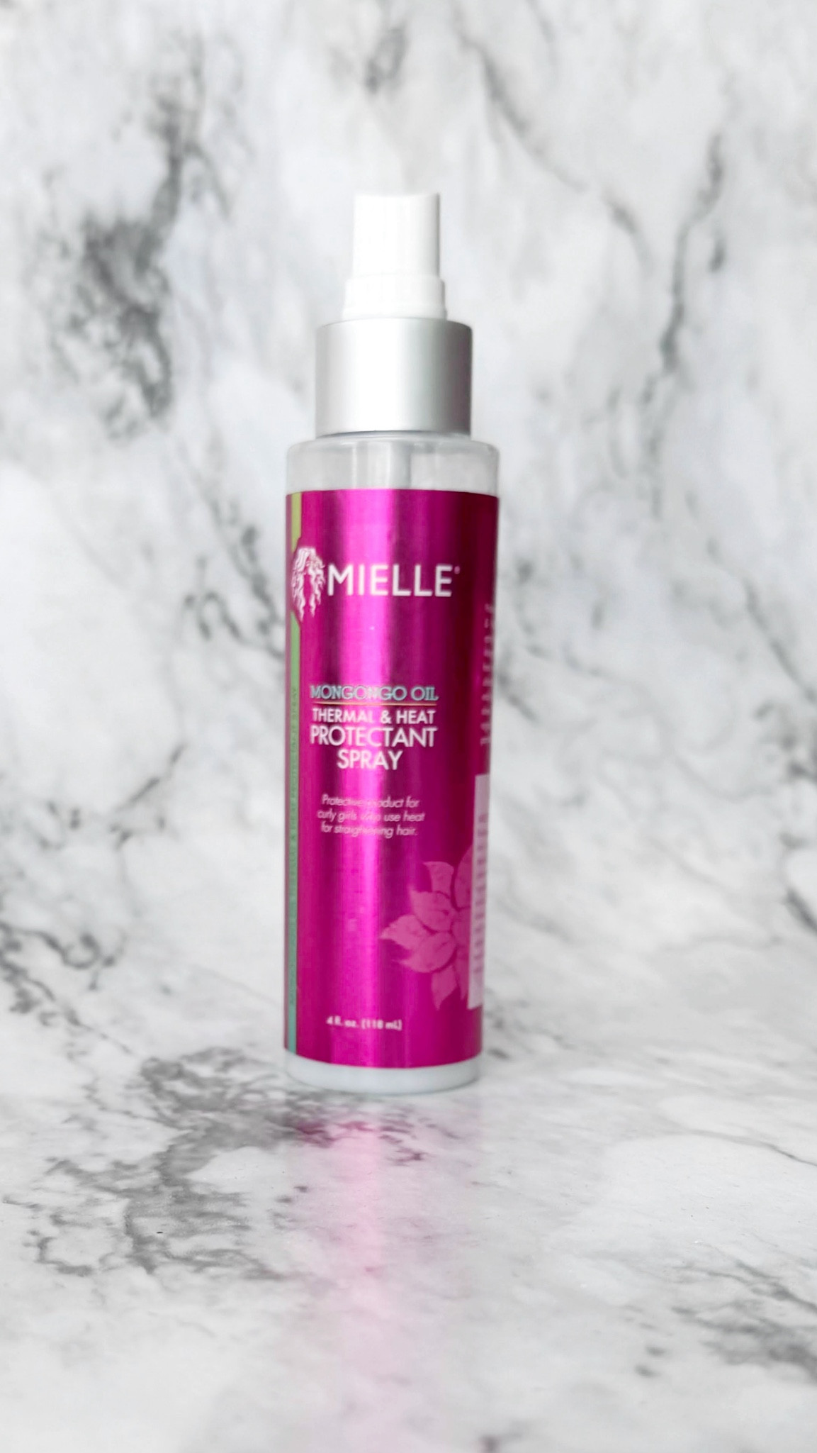 This is my favorite heat protectant for my relaxed hair. I use it before drying my hair with my hooded dryer or blow dryer.

#LTKBeauty #LTKStyleTip