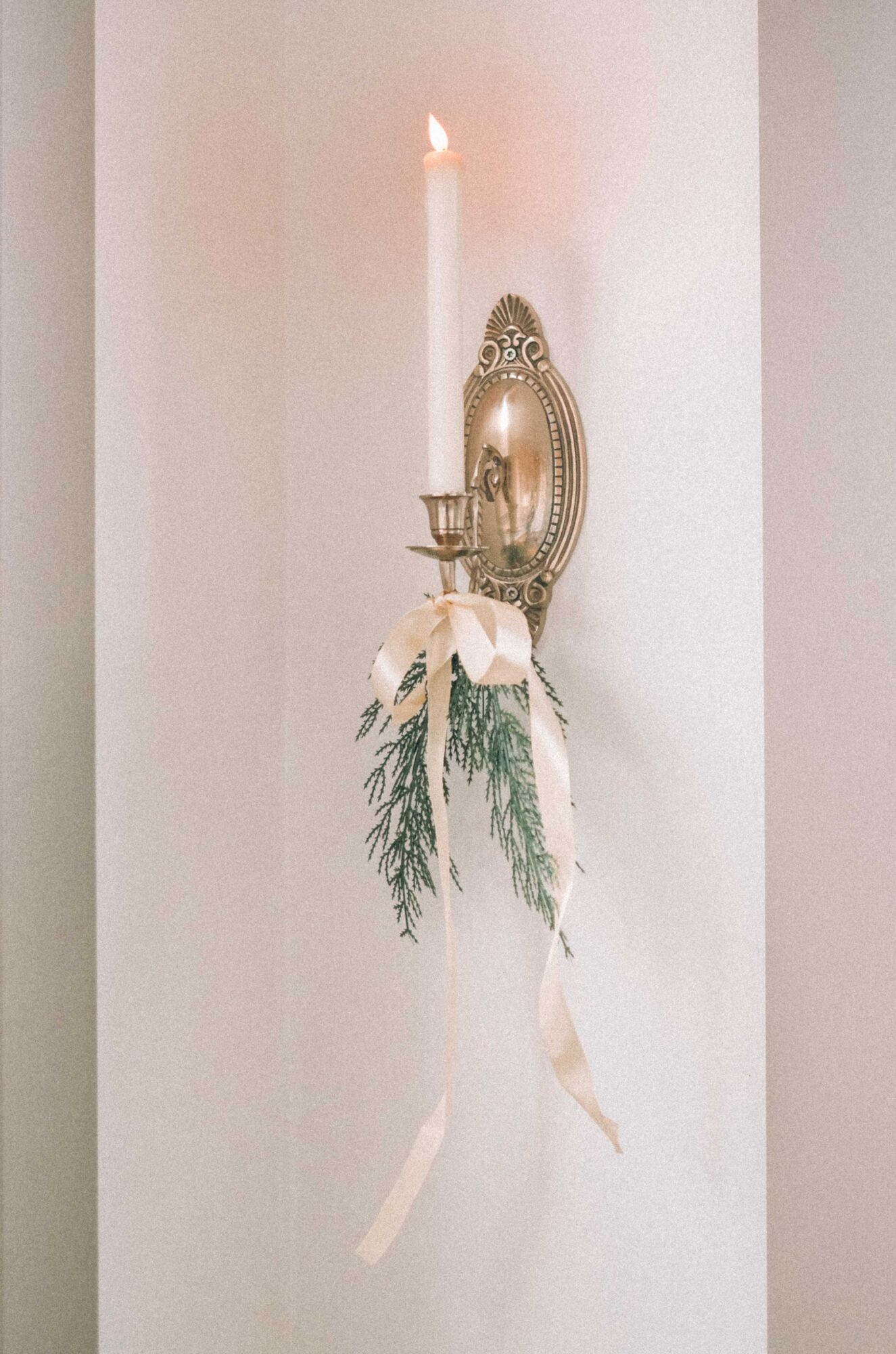 When you think about giving your home that charming, cozy feel for the holidays, lighting is everything! Turn off the “big light” (any harsh overhead lighting) and focus on adding more ambient sources like candles, lamps, and sconces. Add a ribbon and a sprig of greenery for the perfect festive touch. 

 #LTKHoliday #LTKSeasonal #LTKHome