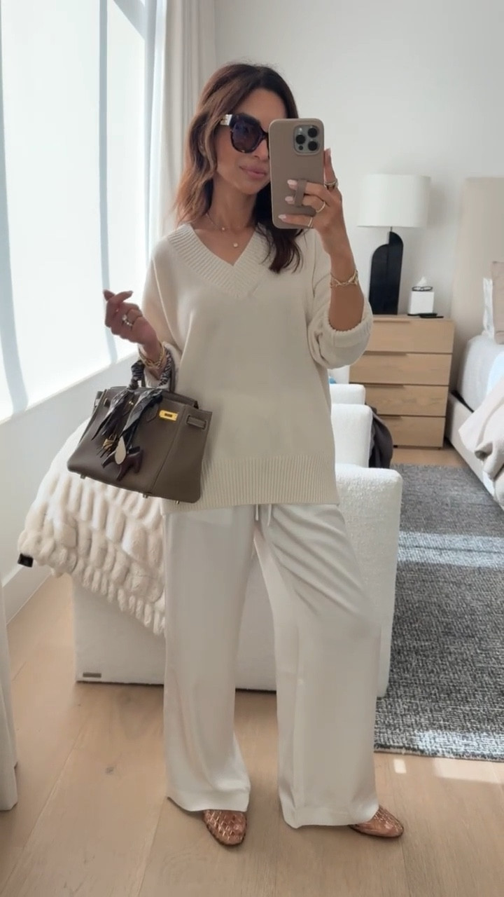 Chic and easy outfit idea for spring. I styled my nude jelly flats with my Quince cashmere sweater and Aritzia satin pants. Super cute for lunch or pick up!

#LTKstyletip 

#LTKSeasonal