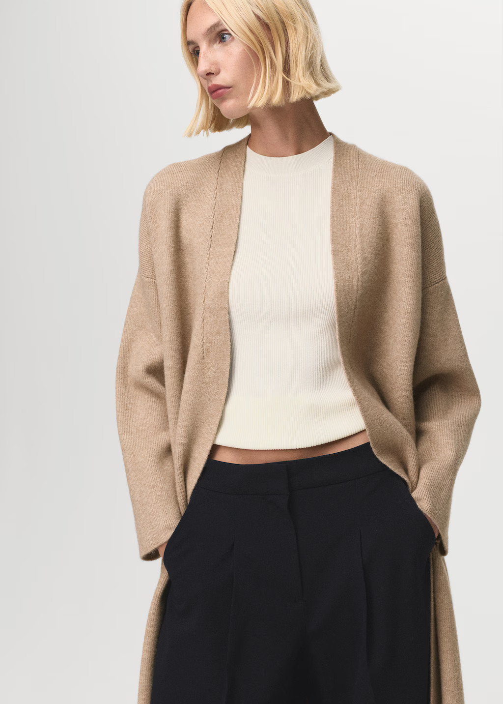 Long knitted coat - Women | MANGO United Kingdom | MANGO (UK)