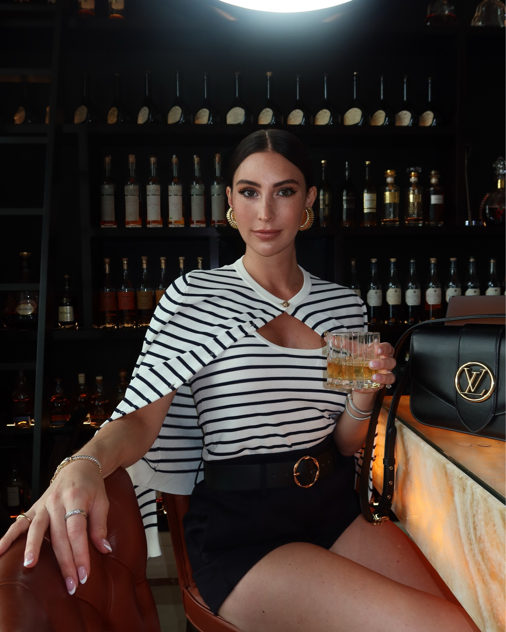 Striped knit cardigan and top with high waisted, belted shorts for drinks and dinner.

#LTKFindsUnder100 #LTKStyleTip #LTKFindsUnder50