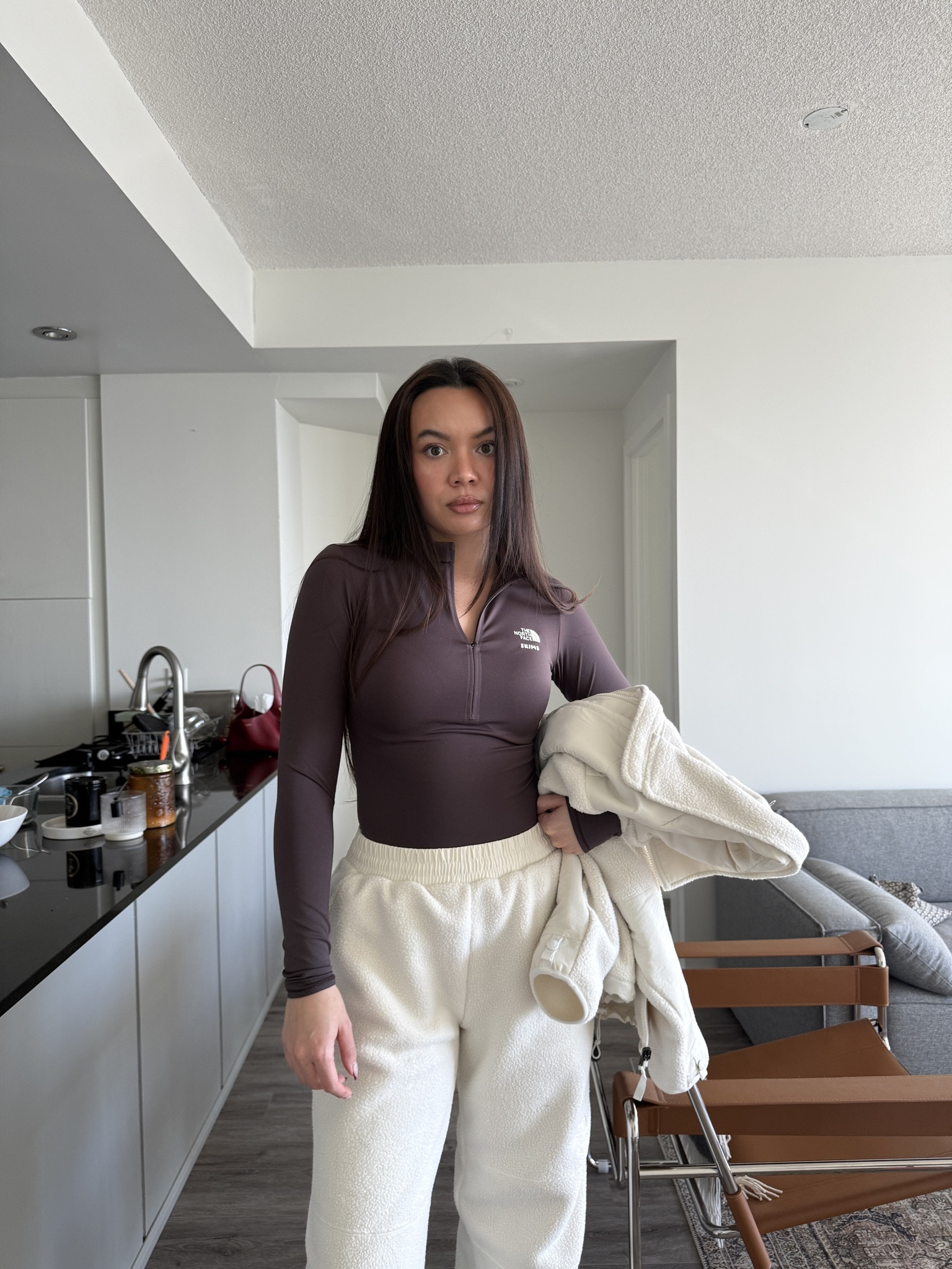 This outfit is the perfect blend of cozy, elevated, and functional. The SKIMS x The North Face Denali jacket and matching pants create a soft, structured fleece set that feels luxurious while still delivering true cold-weather performance. The plush fleece adds warmth without bulk, while the relaxed silhouettes feel effortless and flattering for everyday wear. It’s the kind of matching set that works just as well for travel days and winter errands as it does for lounging or après-ski moments.

Underneath, the SKIMS x The North Face long sleeve base layer anchors the look with a sleek, second-skin fit. The smooth, stretchy fabric sits close to the body, making it ideal for layering under fleece and outerwear while still looking polished enough to wear on its own. The half-zip neckline adds a sporty, modern edge and makes this piece endlessly versatile for cold weather styling.

Together, this look nails elevated winter layering — cozy, minimal, and intentionally styled. It’s a full cold-weather system that feels put-together without trying too hard, perfect for building a chic winter capsule wardrobe.

Keywords for discoverability:
SKIMS x The North Face, Denali jacket outfit, Denali fleece pants, SKIMS base layer, winter layering outfit, cozy neutral set, fleece set outfit, winter travel outfit, luxury loungewear, elevated athleisure, cold weather essentials

#LTKHoliday #LTKGiftGuide #LTKSeasonal