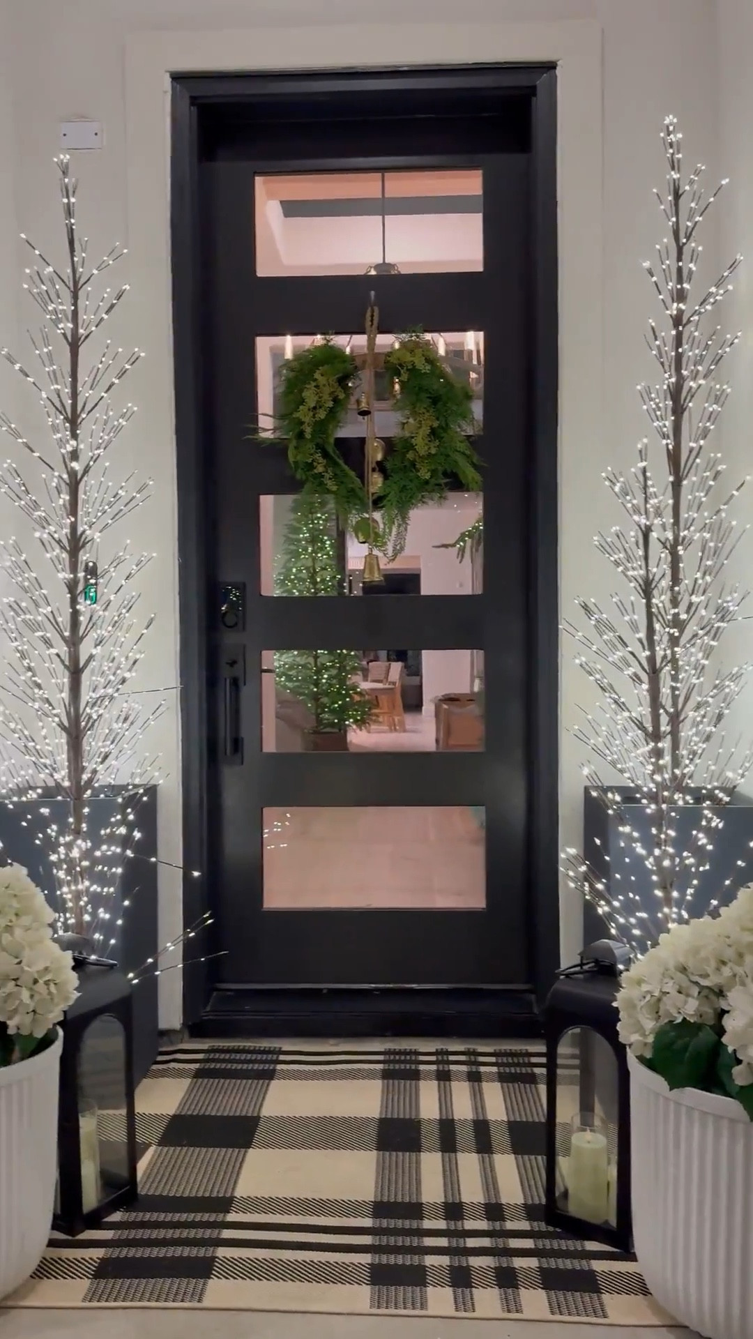 Elevate your holiday decor with these must-have twinkle lights! Perfect for indoors and outdoors, they add a magical touch to your front door. 

🎄

Curation Details: I used 2 Large & 2 Medium sized twinkle trees on each side. They come in L,M,& S!  

Rug is a 4' x 5'7"
and is washable and comes in multiple sizes as well ….🤎

Black planters come in 3 sizes… I used the  27.6Inch size. 🤎 White planters also come in multiple sizes. This curation has the Large size!

I used the S,M, & L Lanterns sizes on each of the sides and placed battery powered candles in them. 

Scroll down to shop!

#LTKSaleAlert #LTKHome #LTKHoliday