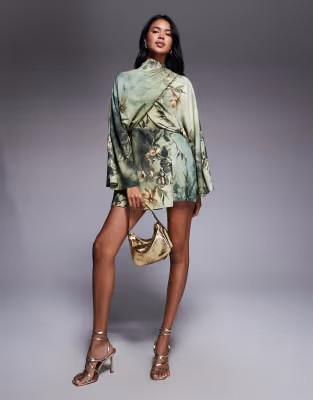 ASOS DESIGN batwing wrap high neck romper in green floral print | ASOS (Global)