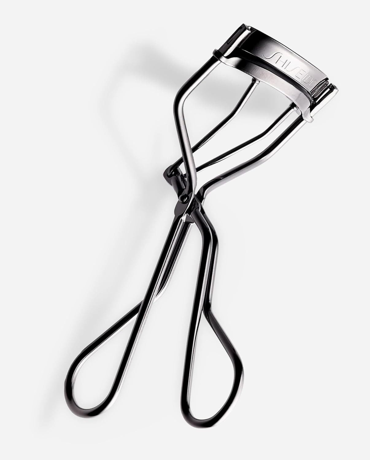 Shiseido Eyelash Curler - Crimps & Curls Lashes for Perfect, Eye-Framing Fringe - Gentle & Safe - Includes Replacement Pad | Amazon (US)