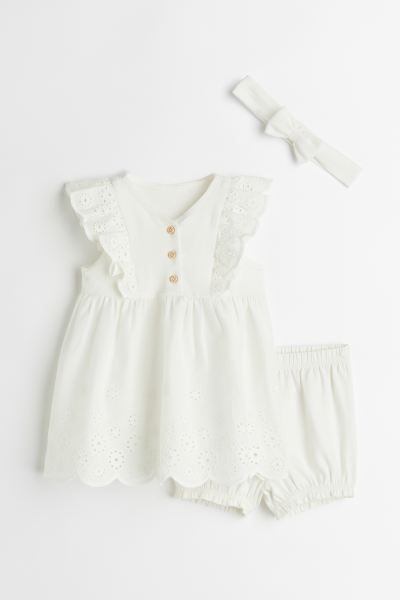Set with a dress, puff pants, and hairband in soft cotton jersey. Dress with V-neck, buttons at f... | H&M (US + CA)