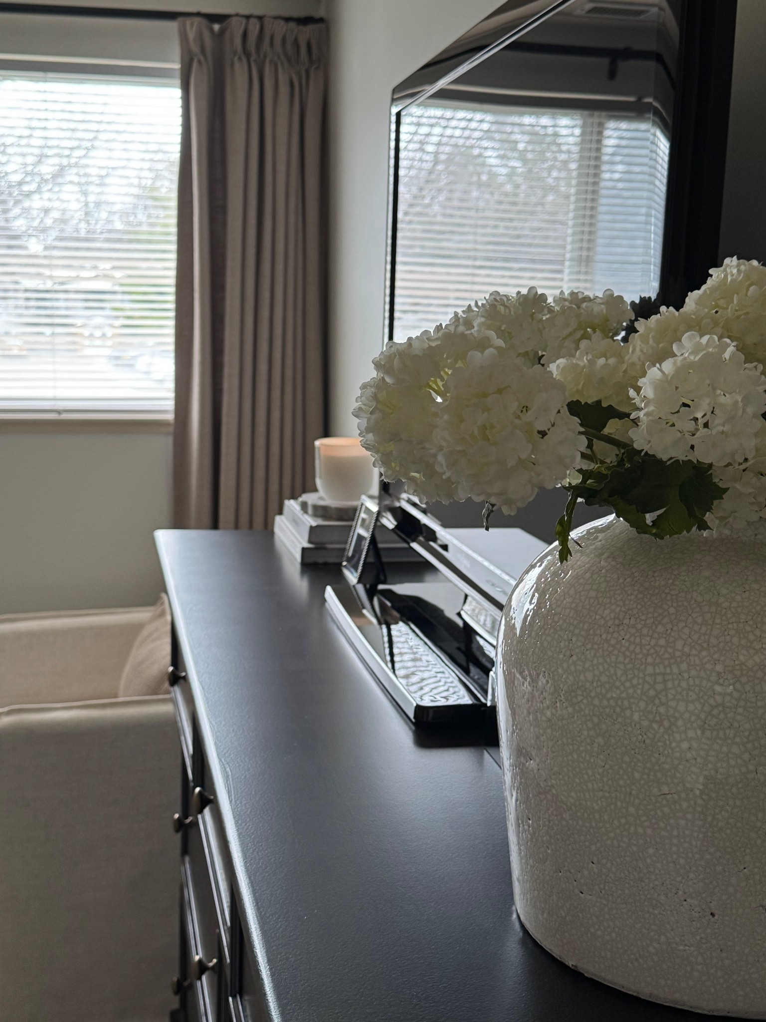Black dresser, arhaus vase, white vase, snowball stems, hydrangea stems, coffee table books, two pages curtains, Burlywood birch, bedroom decor, bedroom styling 

#LTKHome #LTKSaleAlert #LTKSeasonal