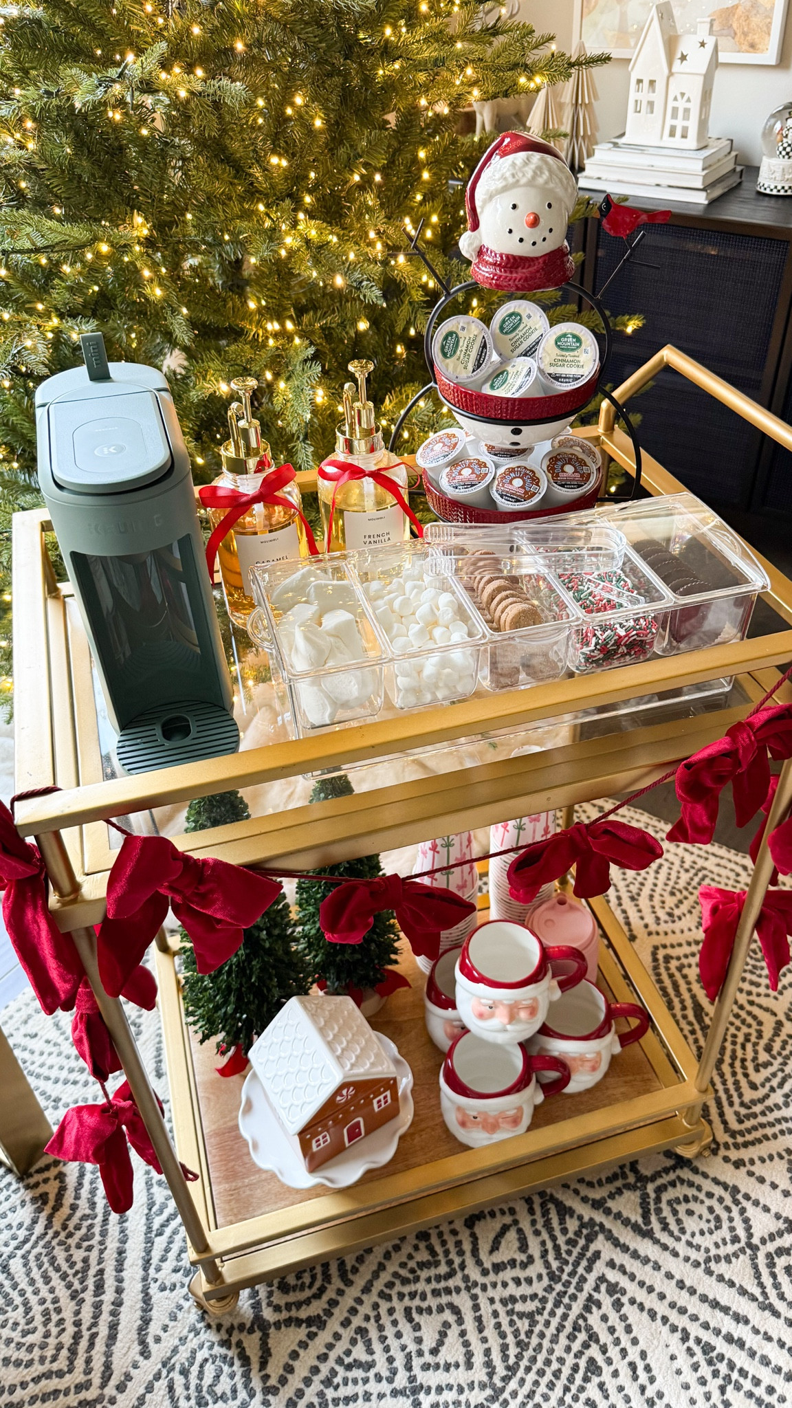 Holiday coffee bar cart to keep everyone warm and cozy this season ☕️✨🎄

Bar cart, condiment server, bow garland, Christmas coffee cups, Keurig K-Mini Coffee Maker, coffee roasters cinnamon sugar, Medium Roast Coffee Pods, gingerbread house, snowman 2 tier server, syrup dispensers, santa mug, Christmas tree, tree skirt, ribbon, paper table top decorations, garland

#LTKSeasonal #LTKHome #LTKHoliday