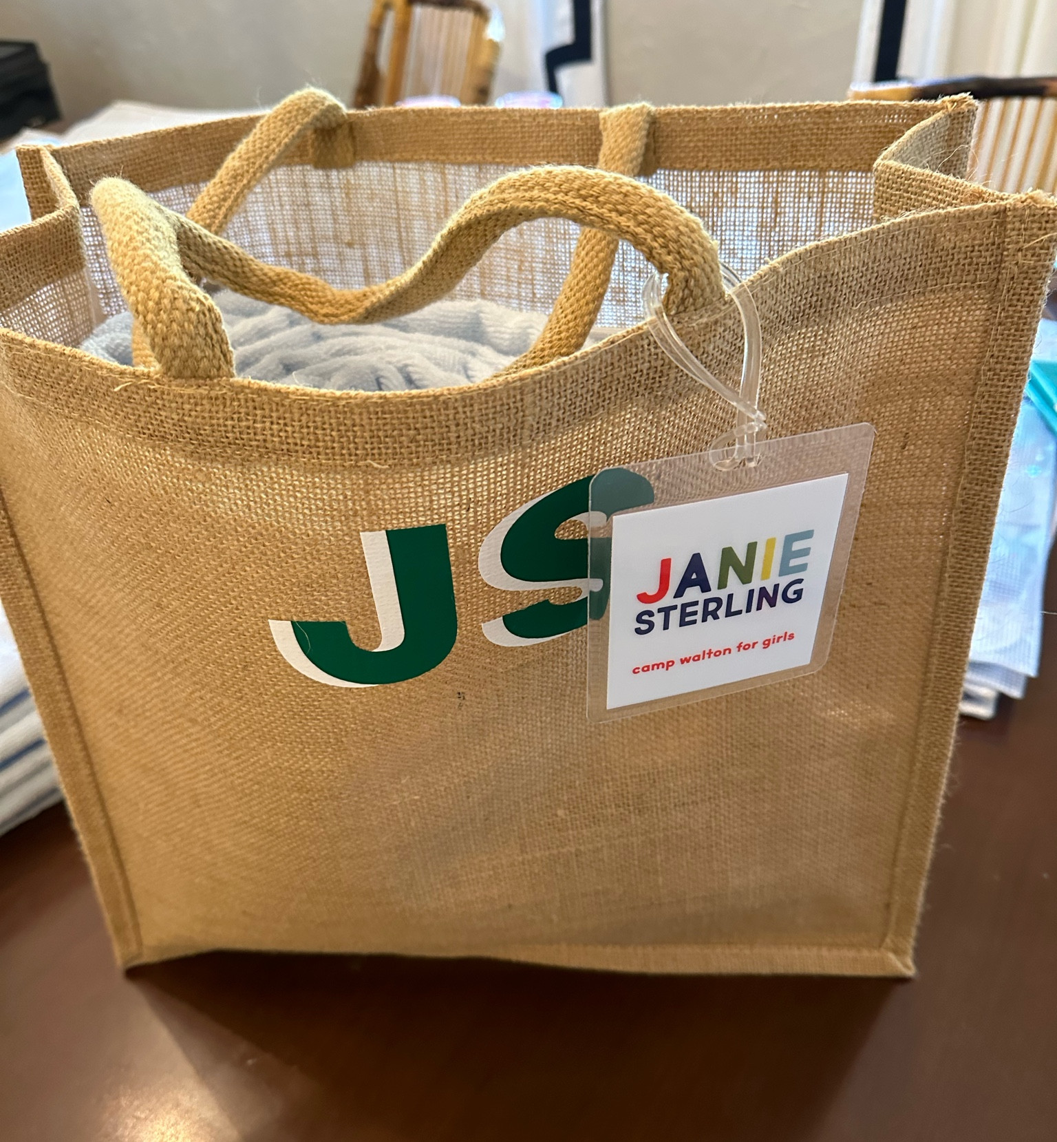 I had the best time putting together goodie bags for my bachelorette weekend!

I used jute tote bags from Sprinkled with Pink shop with my bridesmaid’s initials on the front. Inside the bag were personalized water bottles and pool bags from the brand all in coordinating colors!

Weezie Towels personalized lounge chair covers were high on my wishlist and fit the color scheme and location perfectly. 

Since the theme was Camp Walton it only felt right to include a Camp Cocktail in the tote! Everyone got a different flavor which they can fill with the liquor of their choice to enjoy over the weekend or when they get home. 

Joy Creative Shop is my go-to for personalized paper goods and their camp themed luggage rages were adorable to put on each bag. I also included their scallop notepad in the bag!

It’s not a trip to a body of water without some sort of float and I found three different styles of pool rings that matched our color scheme. I got one for each girl and we ended up using them as decoration on the porch where we had dinner Friday night before putting them in the water. 

As for essentials, I put travel size items that may be handy over the weekend inside each of the zippered personalized pool bags. I included liquid IV, advil, makeup wipes, sunscreen, aloe, lip balm, and eye patches!

My maid and matron of honor handled “branded” items to match the theme and got camp mugs, baseball hats, and hand stitched personalized bandanas that were such a cute touch. 

While bachelorette weekend gifts definitely aren’t a requirement, I knew I wanted to do something special for my friends as a thank you for being in my wedding and coming to my bachelorette weekend! 

#LTKwedding #LTKparties #LTKunder100