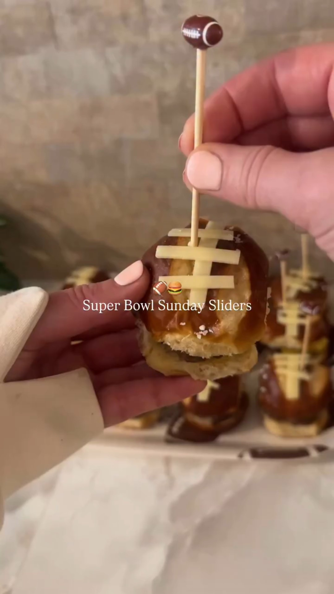 Sporty sliders, laced up and dressed for the occasion 🏈 Save for game day! 

PS. This smokeless indoor grill is amazing for grilling in condos 

Ingredients (about 20 sliders):
– 2 lb ground beef (I recommend 80/20 or 85/15 for juicier sliders – I used leaner 93/7 and added cream)
– 2½ tsp kosher salt
– 1½ tsp black pepper
– 2 tsp garlic powder
– 2 tbsp Worcestershire sauce
– 3–4 tbsp cream (or milk)
– Hawaiian sweet pretzel slider buns
– – Cheese slices (for burgers + extra white cheddar for the “laces”)
– Optional toppings: pickles, special sauce, caramelized onions

Instructions:
	1.	Gently mix the beef with salt, pepper, garlic powder, Worcestershire, and cream just until combined.
	2.	Scoop about 3 tbsp per slider, roll loosely, and rest 15–20 minutes.
	3.	Heat a grill or pan to medium-high and lightly oil.
	4.	Place beef balls on the hot surface and flatten once to form thin slider patties.
	5.	Cook 60–90 seconds per side, flipping once. Add cheese after flipping.
 6.	Assemble sliders on buns with your favorite toppings.
	7.	Cut thin strips of white cheddar and place on top buns to create “laces.” Warm the laces for just a few seconds so they stay put – don’t overheat.
	8.	Secure with football skewers if using, and serve warm.

⁣
 #partyfood #superbowl #burgers #footballsunday

#LTKHome
