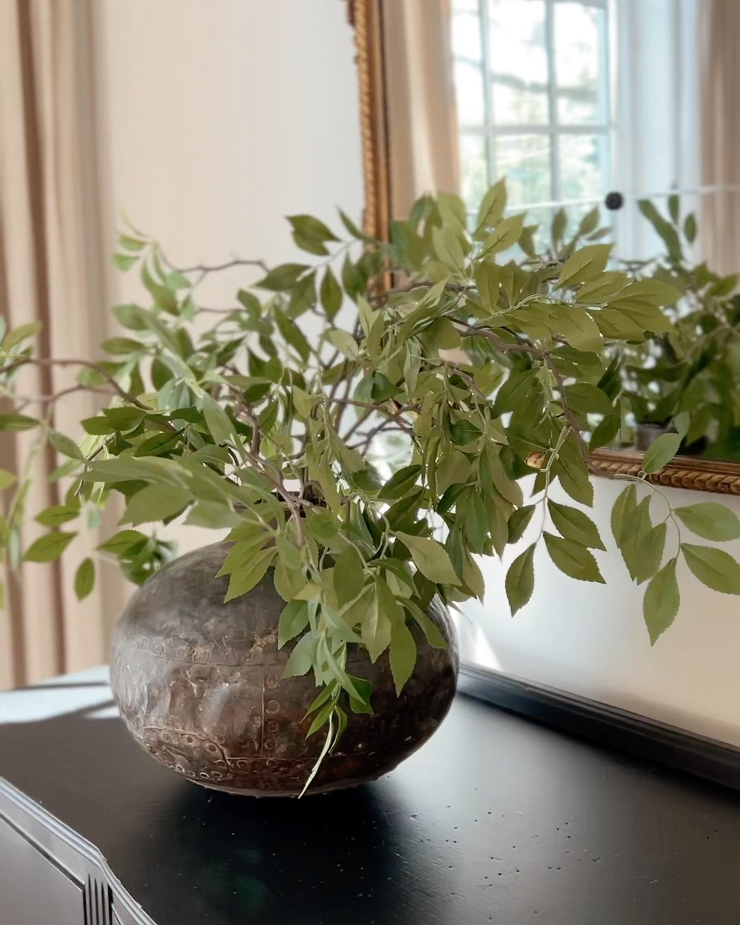 My favorite budget stems. These wisteria branches are on sale for only $6/ea! I used 6 here in a large vase.

#LTKSeasonal #LTKHome #LTKSaleAlert