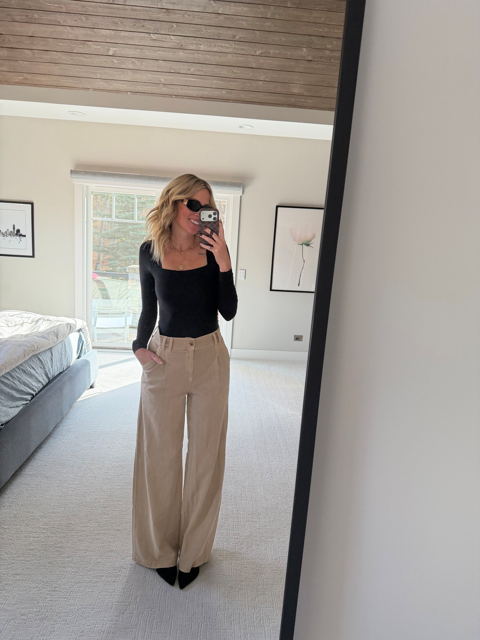 Business casual in wide leg pants for a meeting today 
Basic square neck black long sleeve shirt 
Aerie style 
