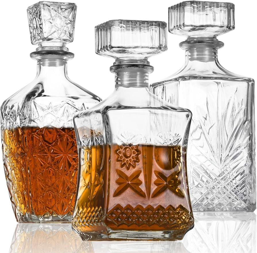 LAWADACH Liquor Decanters Whiskey Decanter Set of 3 Glass Alcohol Bottle for Tequila, Brandy and Vodka Unique Liquor Bar and Party Decorations (28oz*2, 31oz*1) | Amazon (US)