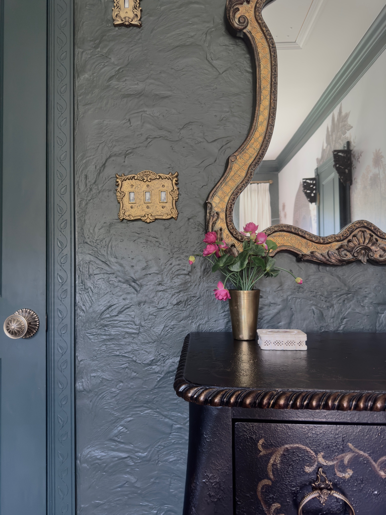 Lotuses hold a piece of my soul. 🤍
I explored countless faux florals, yearning for something that would truly speak to me. This one stood out 🪷 You can’t swipe out without noticing the beautiful switch cover. It came in coal black, this is after rub and buff to match the finish on the mirror. 

#LTKhome #LTKfindsunder50

#LTKHome #LTKFindsUnder50 #LTKSaleAlert