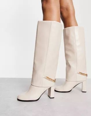 River Island fold over chain detail high leg heeled boots in cream | ASOS (Global)