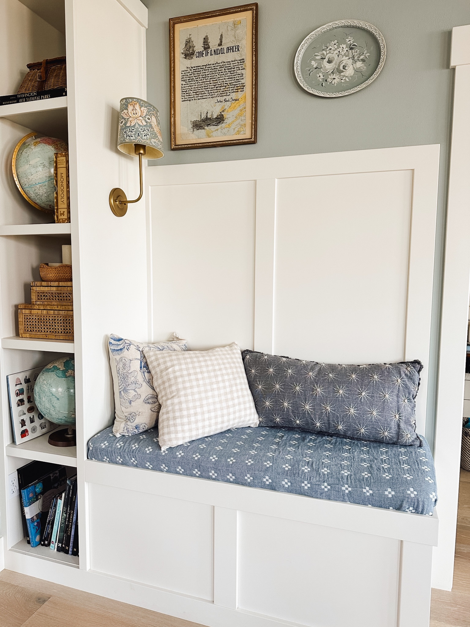 Built in bench sources. Gingham pillow, cane boxes, reversible blanket on bench, sconce and shade, monopoly bookshelf game 

#LTKstyletip #LTKSeasonal #LTKhome