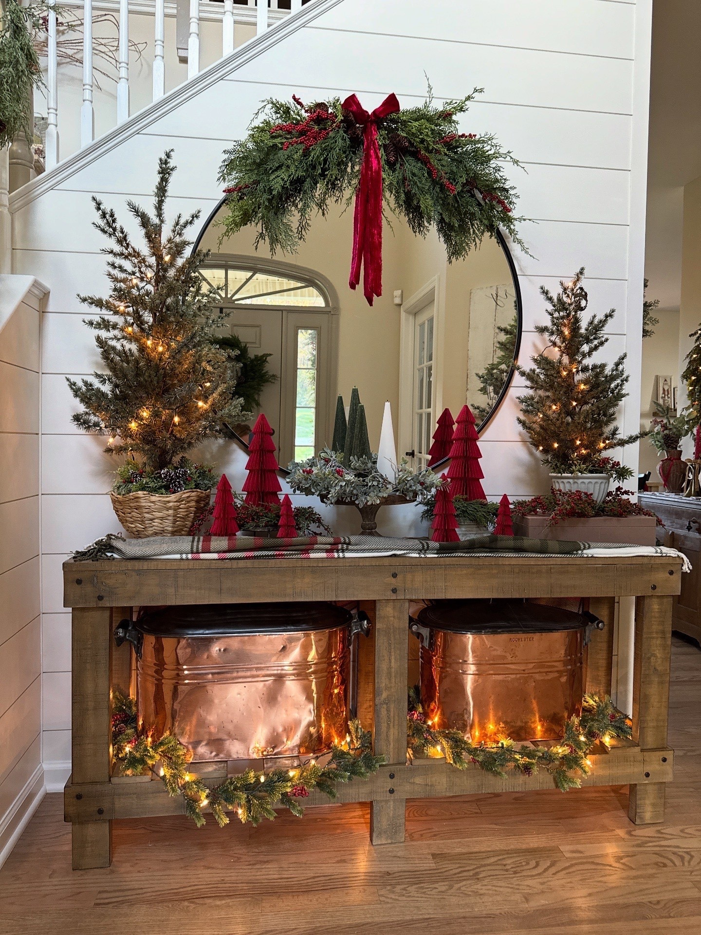 Christmas entryway table and decor. The prettiest 2” wide red velvet ribbon. Set-of-3 classic red paper Christmas tabletop trees. Wooden pedestal riser. Dark green Christmas tree candles. 42” round mirror, garlands and more  

#LTKSeasonal #LTKHoliday #LTKHome