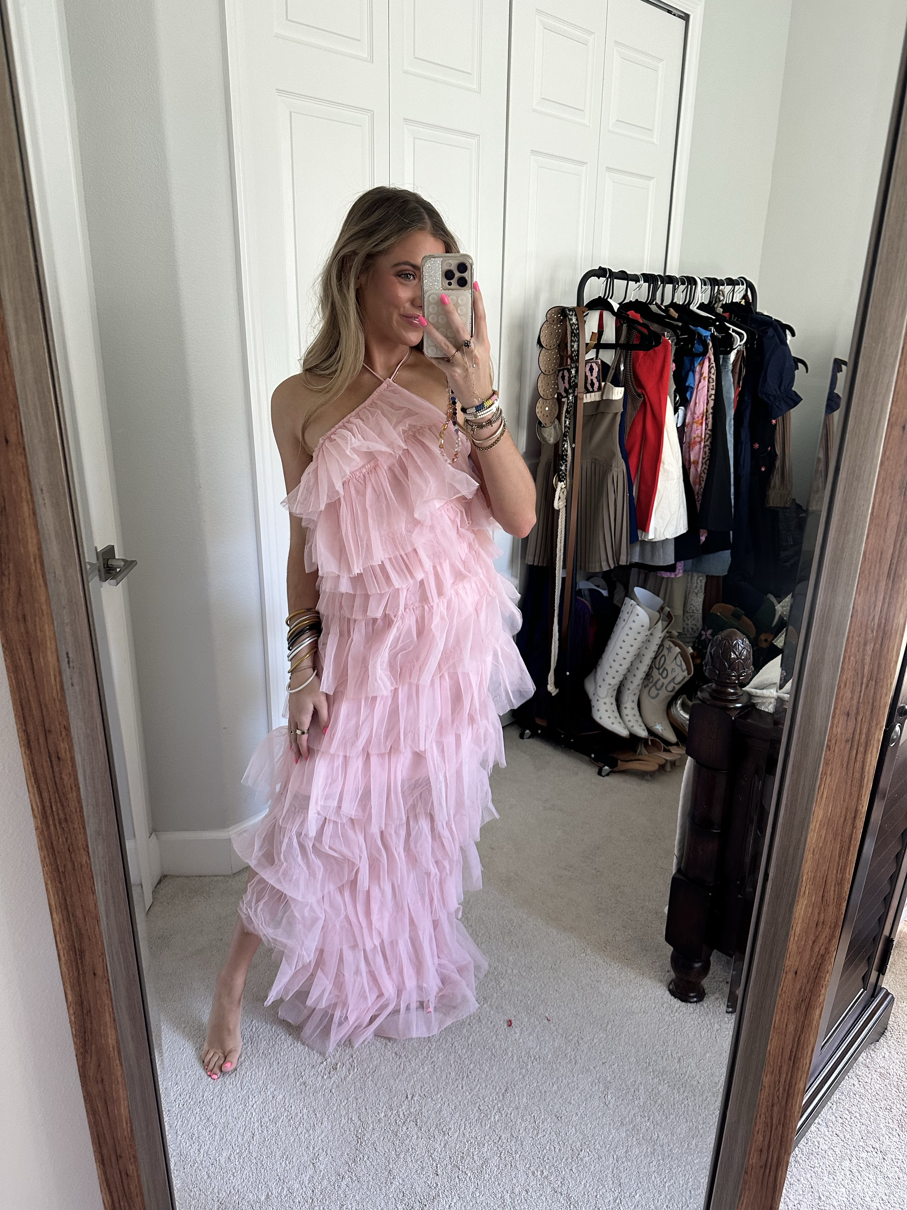 Confete Tremmezina Tulle Halter Maxi - Blush. @shop.Confete. Embrace the pinnacle of chic, eye-catching style with the Tremmezina Tulle Halter Maxi Dress. This exquisite piece is a true embodiment of elegance and modern fashion. It features multiple layers of soft blush tulle that cascade in dramatic ruffles, creating a breathtaking effect.
The halter-style neckline adds a touch of sophistication, making it a standout piece for any special occasion. This dress is thoughtfully half-lined, ensuring both comfort and style. The Tremmezina Tulle Halter Maxi Dress is also available in a classic cream color, providing an option for every preference. Whether you're attending a wedding, a baby shower, or a romantic honeymoon outing, this dress is sure to turn heads and leave a lasting impression.
Elevate this stunning maxi halter dress with delicate jewelry and strappy heels for an effortlessly chic look, or pair it with a sleek clutch and minimal accessories for a more refined, elegant ensemble


#LTKWedding #LTKParties #LTKStyleTip