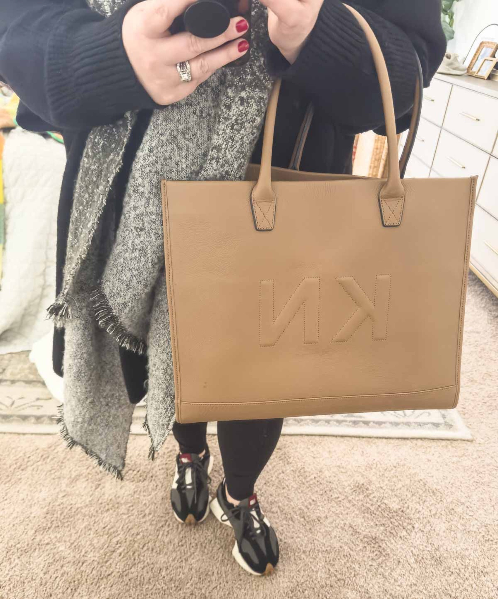 This leather bag is a perfect work bag, handbag or travel bag. Mine has the large Trapunto style monogram, but there are lots of other options (and colors and sizes) available. gift idea work tote travel tote day bag purse new balance sneakers

#LTKItBag 

#LTKTravel #LTKBeauty