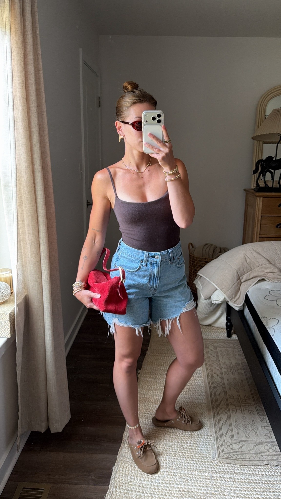 7/16/26 Casual Summer Outfit of the Day

An easy summer outfit I’d wear on repeat 🤎 Wearing my Abercrombie bra-free bodysuit with Abercrombie denim shorts, Bibi Lou shoes, my red J.Crew suede bag, and Crap Eyewear sunglasses. Simple, comfortable pieces with the perfect pop of color. Everything I can link is linked here ✨

#LTKootd #LTKSeasonal
