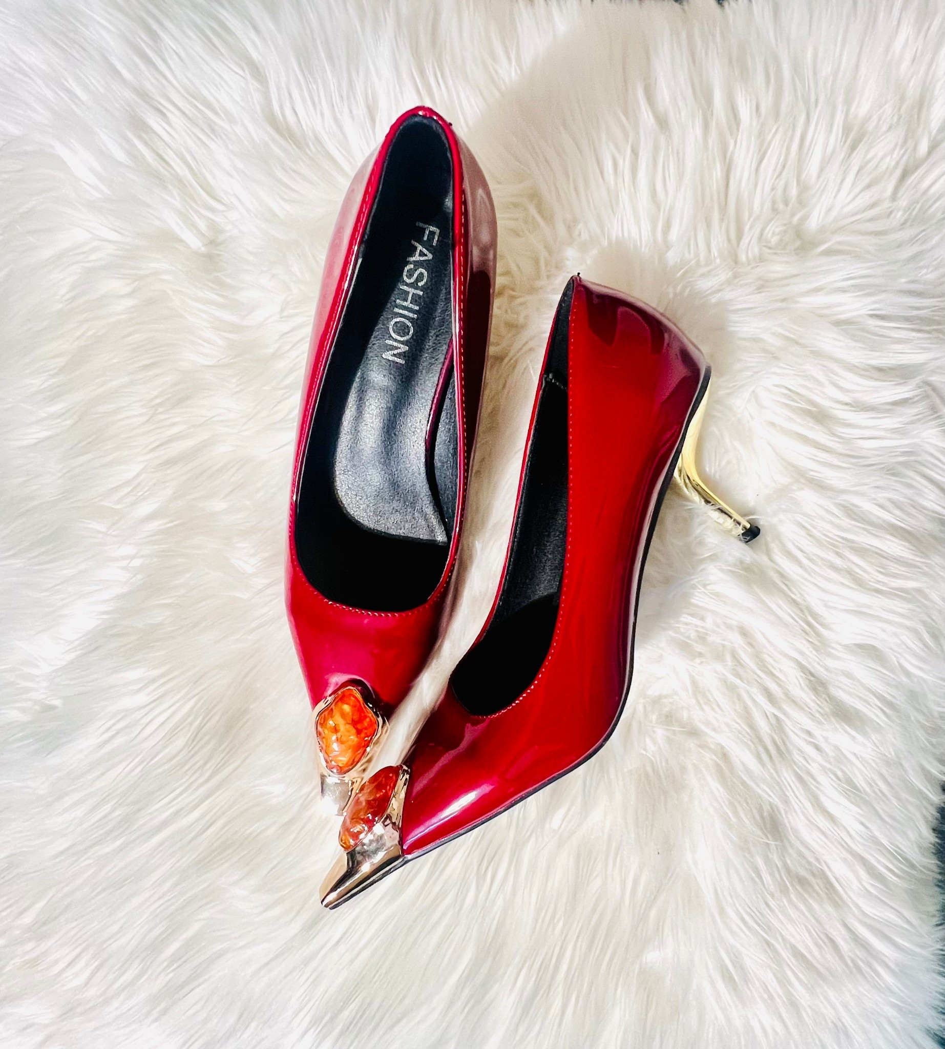A classy statement shoe without the luxury price tag. Burgundy pointed toe, gold cap toe, faux gem detail, and a comfy kitten heel—bougie energy on a budget. True to size and comfortable. 

#LTKFindsUnder100