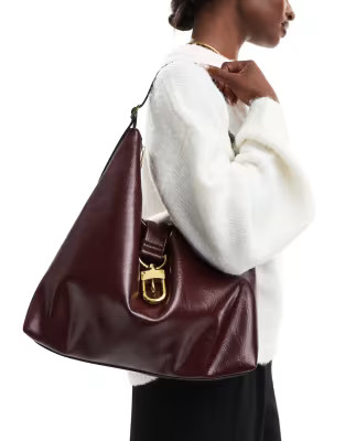 ASOS DESIGN statement buckle slouch tote bag in burgundy | ASOS | ASOS (Global)