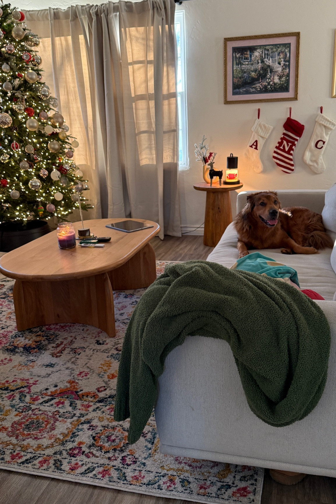 holiday living room details ~ rug, curtain, coffee table and christmas tree linked, couch is from Lulu and Georgia but not listed on site, it’s called Alzira Sofa! 

#LTKCyberWeek #LTKHoliday #LTKSeasonal