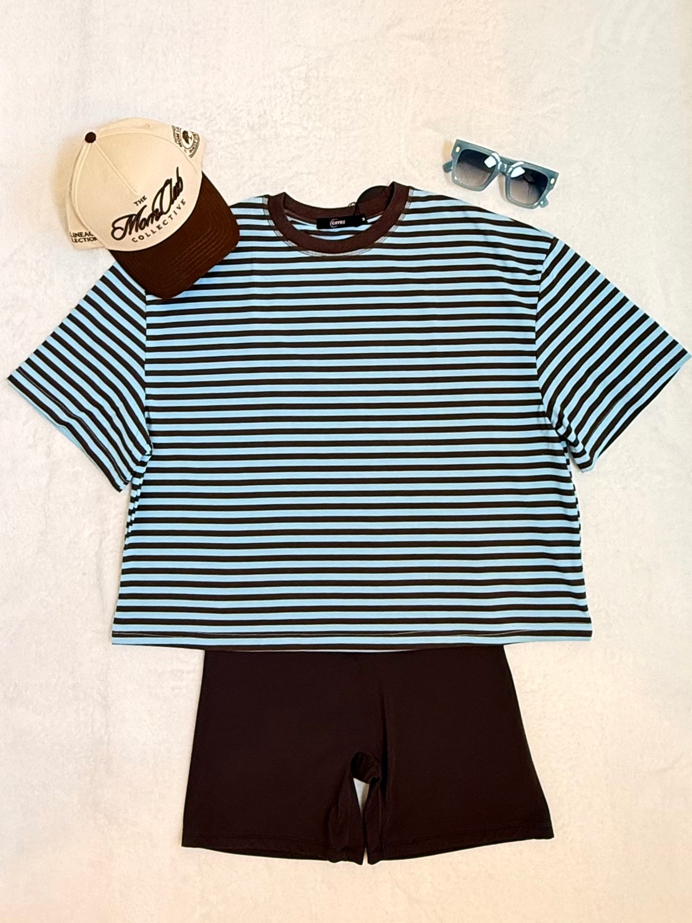 Easy weekend uniform loading 🤎🩷 This oversized striped tee is giving effortless summer style — pair it with unissu 6’ brown shorts for a comfy but put-together look. Topped it off with the cutest “Mom Club Collective” trucker hat (obsessed with this one, moms 🙋‍♀️) and my go-to pink sunglasses from @SOJOS VISION  (use SYLWIASOJOS on Amazon to save) 
Perfect for school pickup, errands, or just living that Polish Mom in AZ life ☀️ 
	•	🤎 CHYRII Oversized Striped Tee (blue/brown, crewneck, Y2K-inspired) medium
	•	🩷 High-waisted workout/bike shorts — clay brown in medium
	•	🧢 “The Mom Club Collective” trucker hat — cream/brown, family owned
	•	🕶️ blue tinted sunglasses

oversized striped tee, mom trucker hat, pink bike shorts, casual mom outfit, summer streetwear, Y2K stripe top, comfy mom style, athleisure outfit

#LTKmomlife #LTKActive #LTKTall
