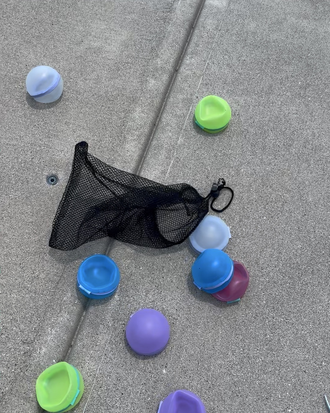 We are in LOVE with reusable water balloons! They are a HIT at every pool playdate! No clean up needed! These provide endless fun with the kids! My son plays with them ALL the time, and they are easy to clean up AND store! They fill up in two seconds! So easy to use! #refillablewaterballoons #reusablewaterballons #waterballoons #summerfinds #summertoys #onsale #waterplay #pooltoysforkids 