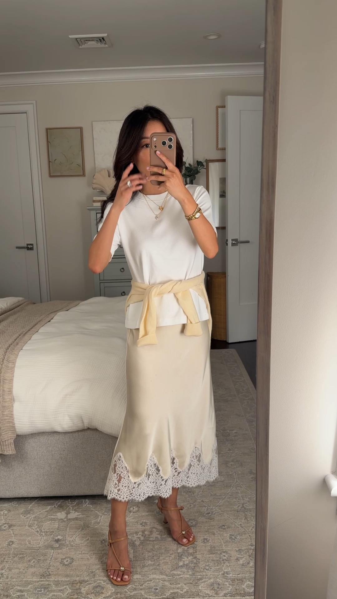 Size info below! • Satin skirt XS in Seaside Cream, I sized up 
• Cotton tee XS, sized up for looser fit 
• cashmere sweater xs 
• sandals 5.5 
@Aritzia #aritziapartner 
summer date night outfit ideas, girls dinner , satin midi skirt, petite style

#LTKPetite #LTKSeasonal #LTKootd