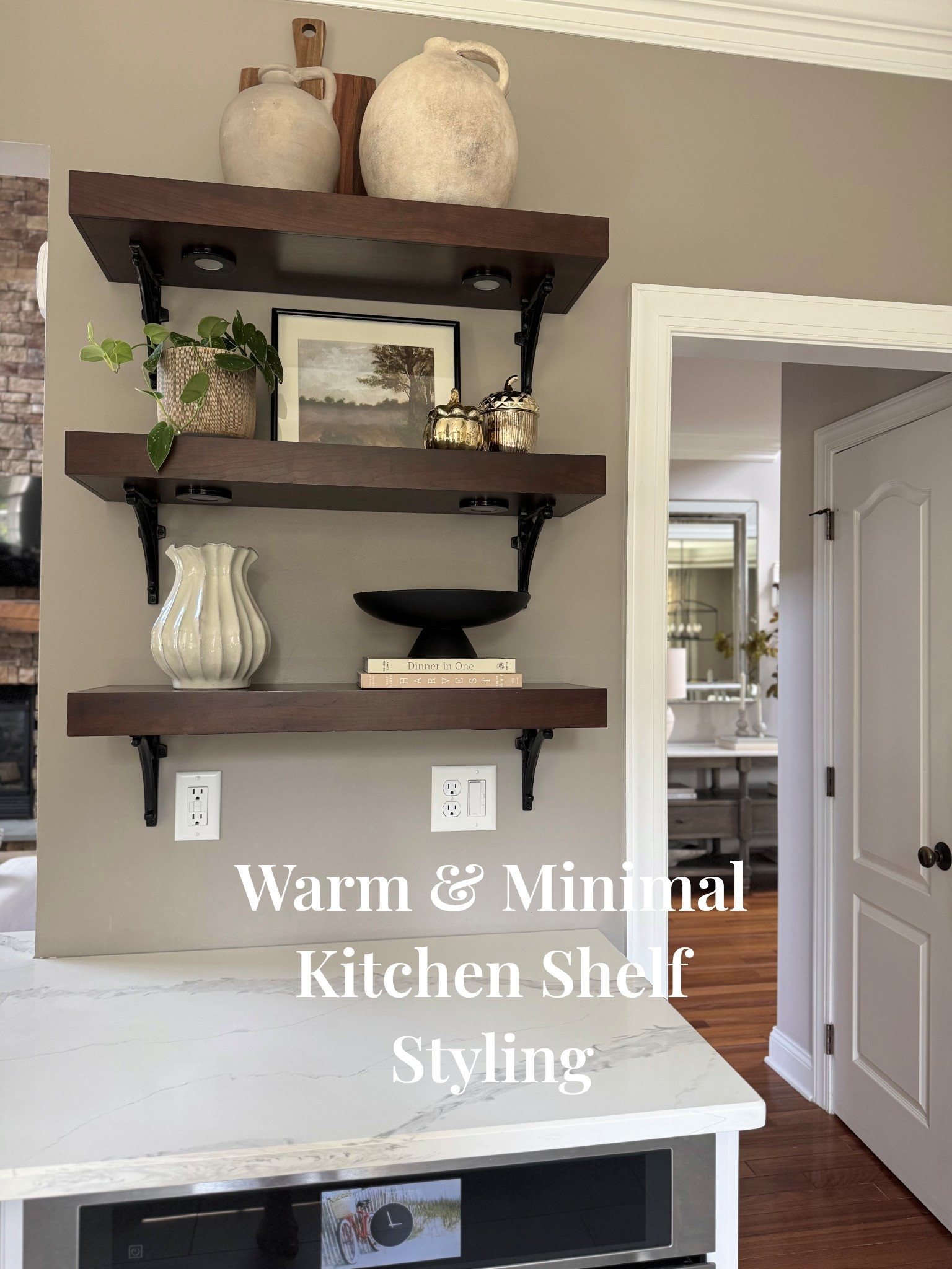 Warm and neutral timeless kitchen shelf styling 
#kitchenshelfdecor #kitchenshelves #transitionalmodern #neutralhomedecor #collectedhome #timelesshome #potterydecor #shelves 



#LTKHome #LTKSeasonal