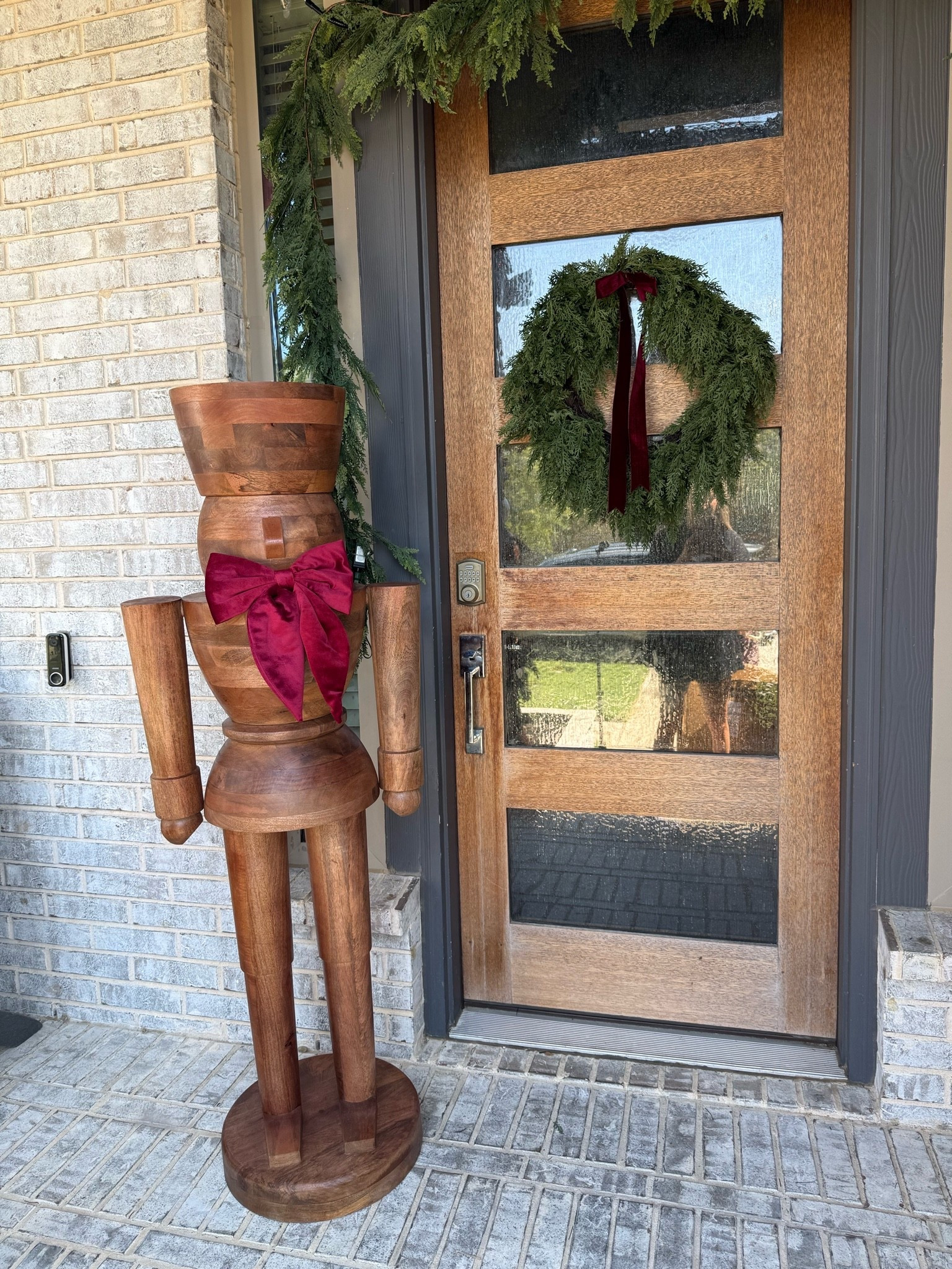 NEW ARRIVAL at Walmart and I think this one is going to be HUGE 🤎🎄

My Texas House just came out with a 5-foot wood nutcracker, and look how good he is on the porch?! I added a velvet bow and immediately fell in ..Would you put one on your porch or get a pair? 👀

#WalmartFinds #MyTexasHouse #ChristmasDecor #ChristmasPorch

#LTKHome #LTKSeasonal #LTKmomlife