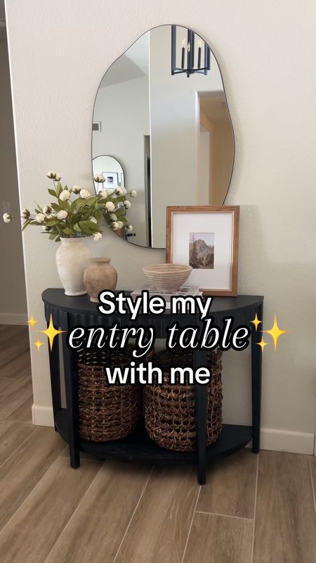 Styling our entry table! I’m obsessed with this asymmetric mirror 😍 also seen them called organic mirror. It makes me happy every time I walk by! 
#homedecor #homestyling #entrytabledecor #mirror #consoletable #fauxpeonies 

#LTKHome #LTKSaleAlert #LTKStyleTip