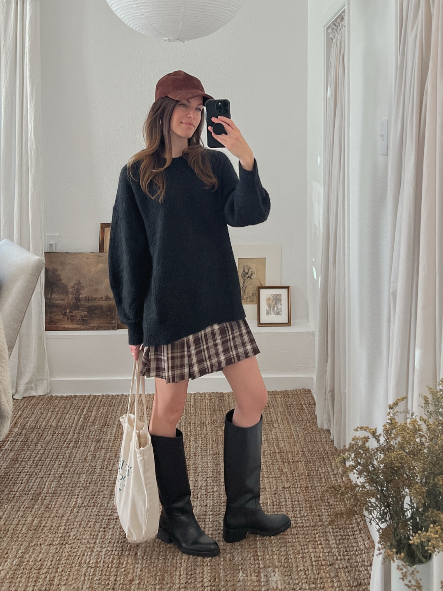 Cutest coffee shop outfit. Wearing my Aritzia brown plaid skirt with my Everlane Alpaca Crew sweater. I sized up 2 sizes in the sweater for an oversized fit! 

#LTKShoeCrush #LTKStyleTip #LTKSeasonal