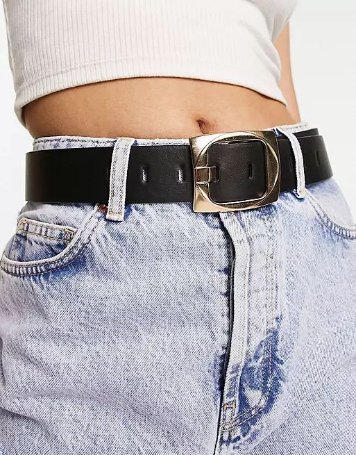 ASOS DESIGN chunky gold buckle waist and hip jeans belt in black | ASOS (Global)
