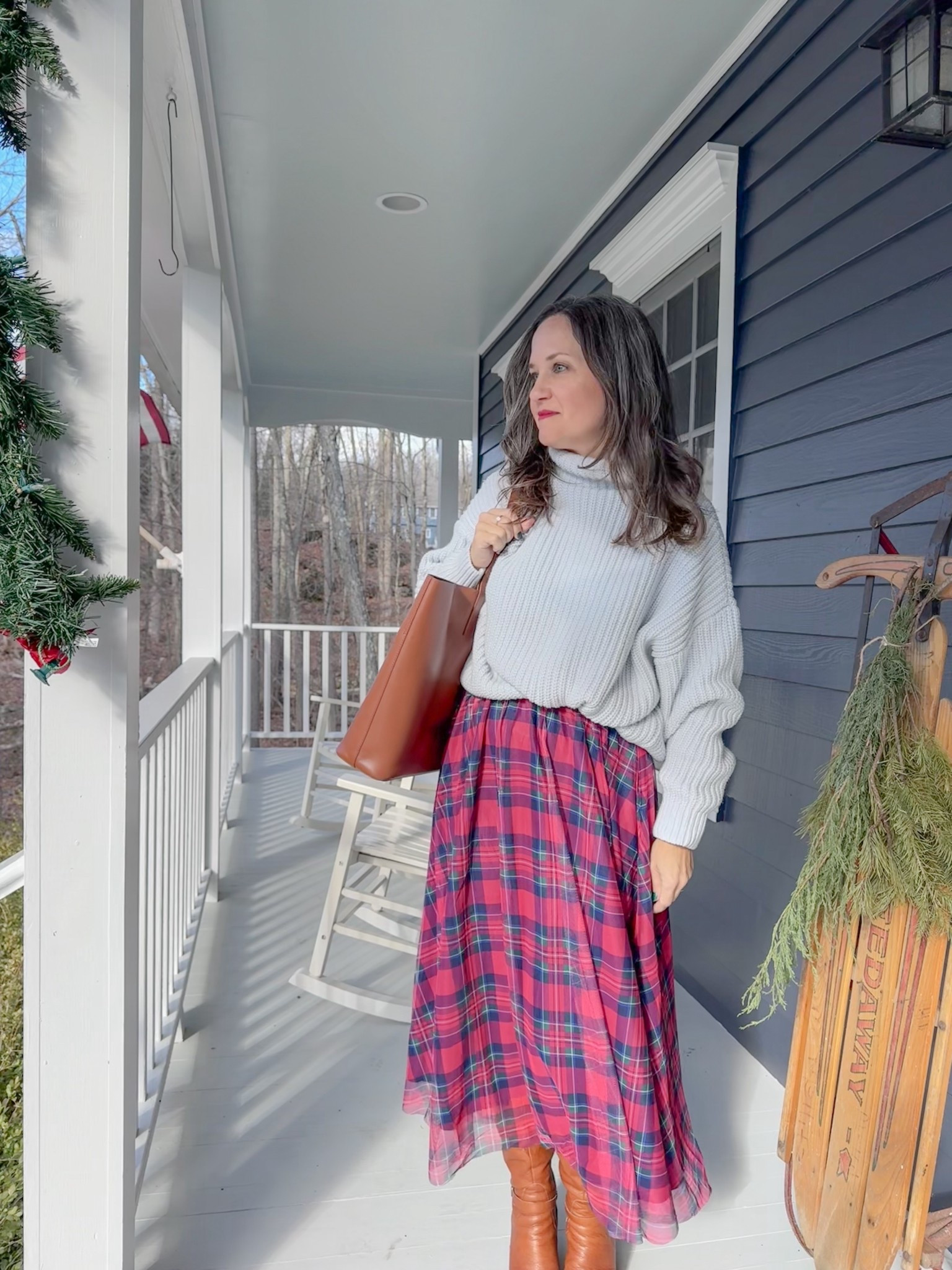 Festive holiday business casual style today! I feel like I can put on heels and be ready for an evening outing or date night. Free People swim too deep sweaters are very versatile. I’ve had them for years! Skirt is Vineyard Vines, boots are Born and tote is Everlane. 

#LTKootd #LTKHoliday #LTKOver40