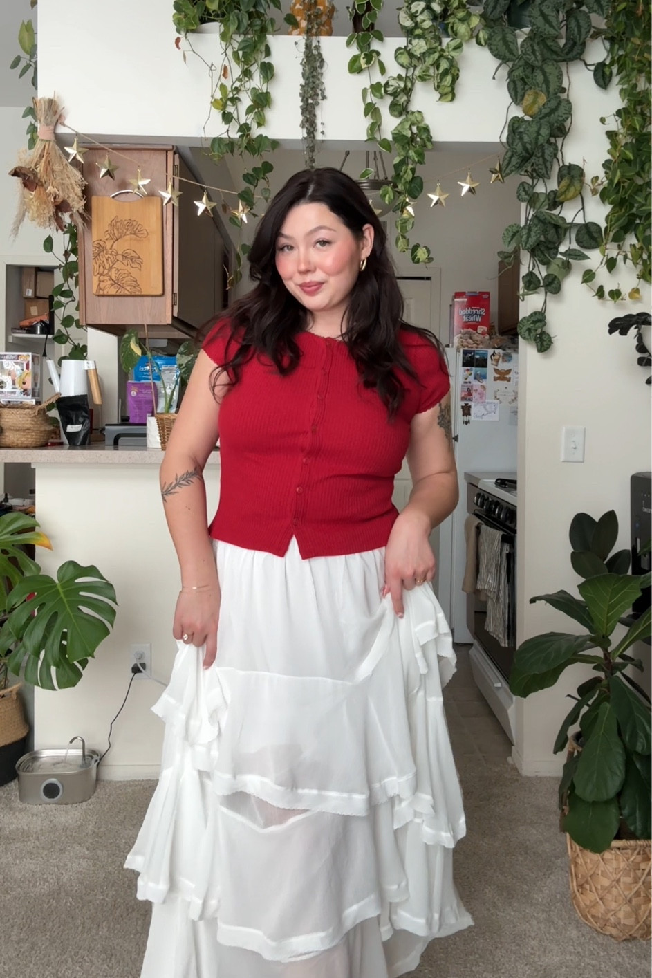 Size L in top and skirt, sleeves are a lil tight so could even size up! 