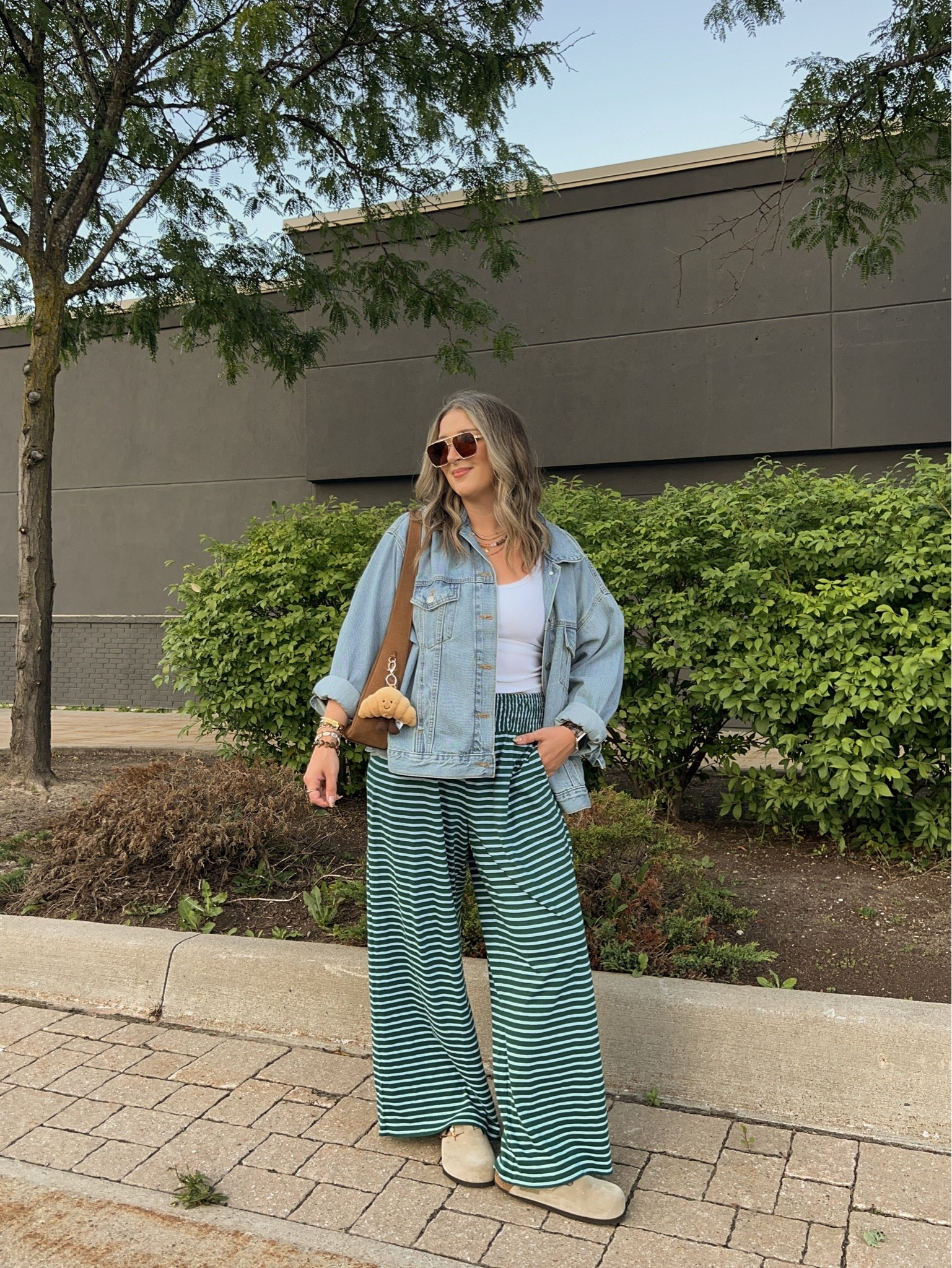 Comfy fall outfit! Wearing M in the bra free tank and L in the striped pants. Also linked similar sweater material pants for cooler weather! Sized up to XL in the denim jacket for an oversized fit. I’m a 9.5-10 shoe and wear a 40 in the Birkenstocks

#LTKfall #LTKsale #LTKstyletip