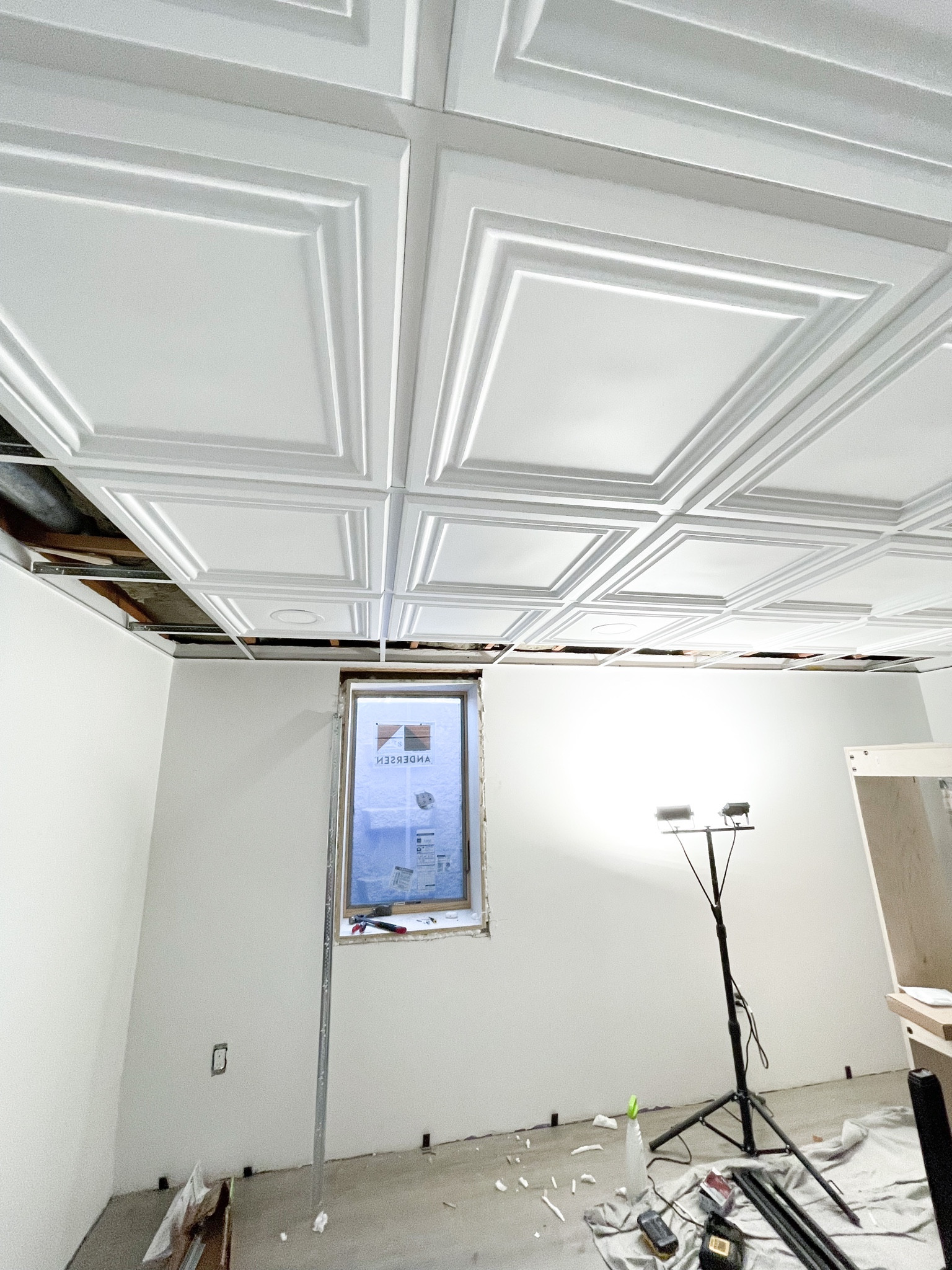 Say goodbye to plain ceiling tiles and hello to these beauties! Transforming this basement has been so easy with these tiles. 

#BasementMakeover #CeilingTileUpgrade #HomeRenovationGoals #DropCeilingDesign #DIYHomeImprovement #TransformYourSpace #InteriorInspo #HomeSweetHome