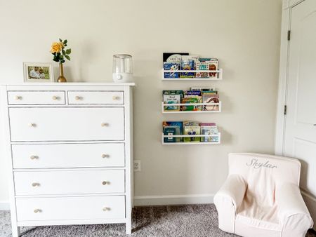 Little girls room and decor: tall white dresser, floating book shelves and books, pink toddler chair from Pottery Barn, humidifier and decor

#LTKhome #LTKkids #LTKFind