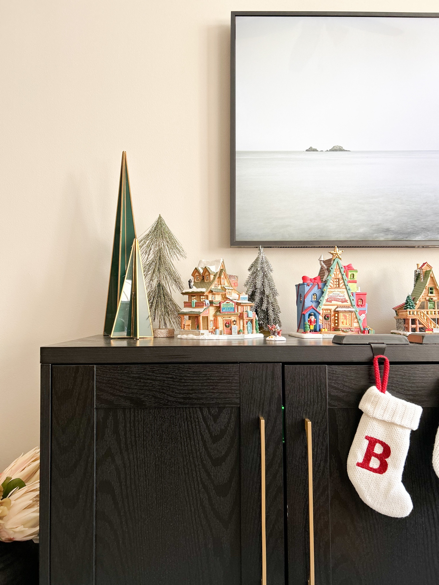 Christmas village
Christmas tree
Stocking
Pet stocking
Media cabinet
Restoration hardware dupe
Tv cabinet
Storage cabinet
Black cabinet
Living room ideas
Living room decor
Living room inspo 
