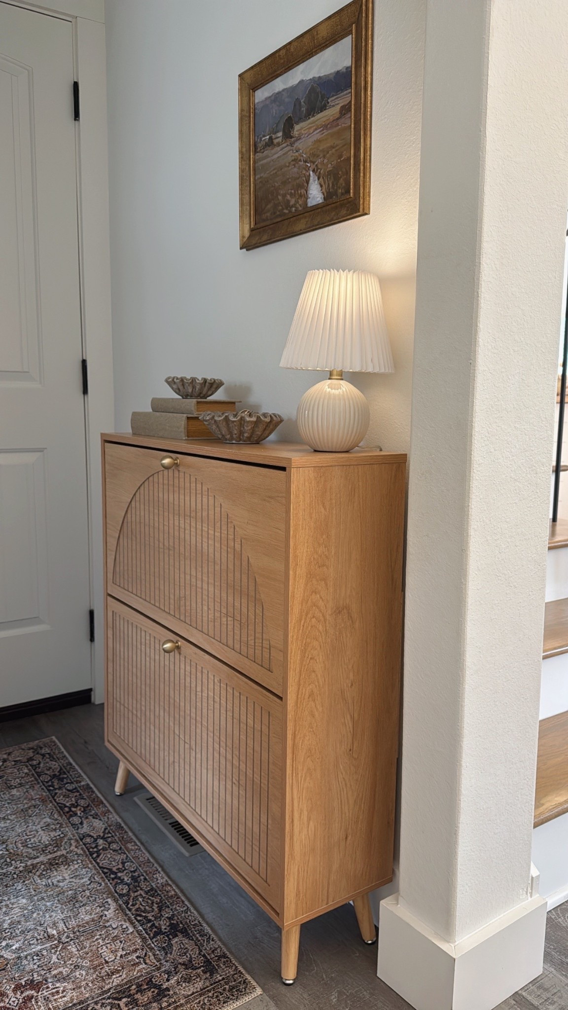 You’d never know this little cabinet holds 16 pairs of shoes! 😍👟

#LTKHome